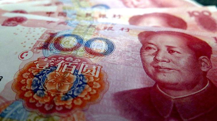 Юань придавило на фоне крупнейшего за 10 лет оттока капитала из Китая