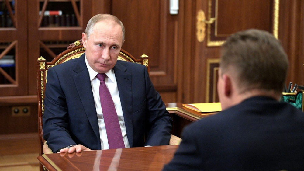 Путин поручил разработать поправки в законы для размещения токенов
