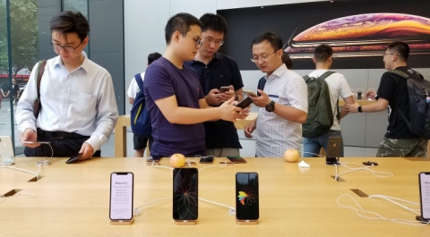 Китайские компании бойкотируют Apple, угрожая уволить пользователей iPhone