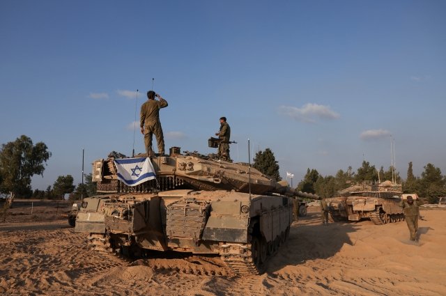 Число жертв израильских атак по сектору Газа возросло до 2 228 человек